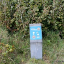 Modern route marker pointing the way to the hermitage