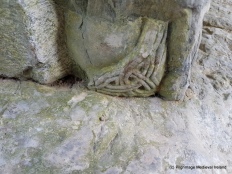 Finely carved decoration at the base of the doorway leading into the church at Askeaton Friary.